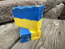 Royal blue and bright yellow striped soap bar modeled after the Ukrainian flag.