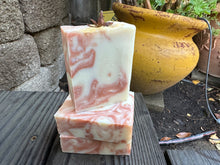 Beige and golden tone soap bar with anise on top