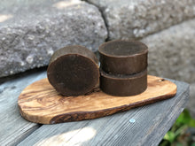 Round soap bar brown made with pine tar
