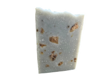 Cold process soap gray/brown and beige with African Black soap crumbles embedded in it