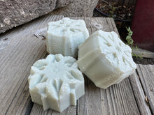 3 snowflake shaped blue/off-white soap bars