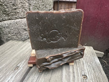 Rectangle soap bar born stamped with Simon Sudz on the front made with pine tar